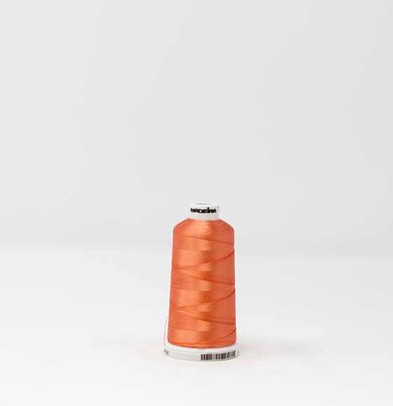 #911-1254 1,100 yard spool of #40 weight Dark Salmon Rayon machine embroidery thread.